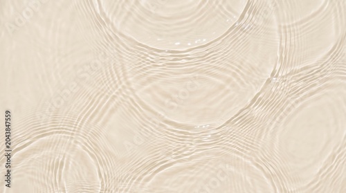 Close-up of beige textured surface with circular patterns