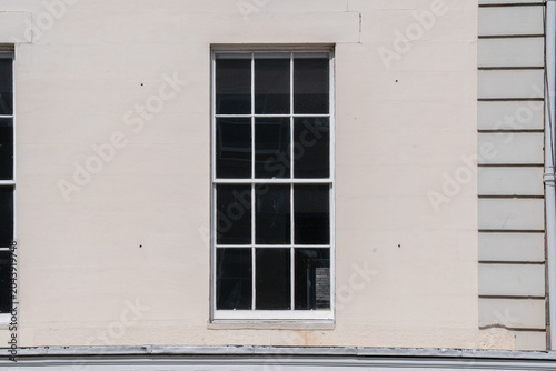 Ancient medieval stone window in an old European castle wall