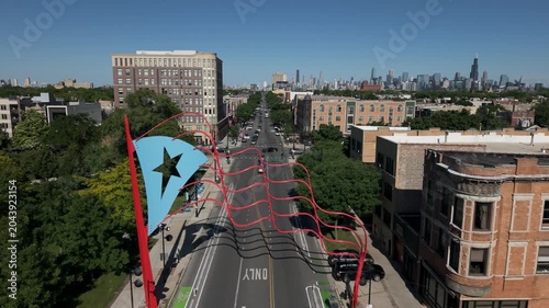 Puerto Rican flag in Chicago's Humboldt Park neighborhood. 

Taken June 2nd, 2026 in Chicago, IL - The drone backs away from the flag