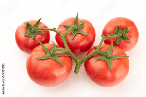 Schilderij op canvas A Bunch of Tomatoes Sold at a Shanghai Wet Market, China on White Background