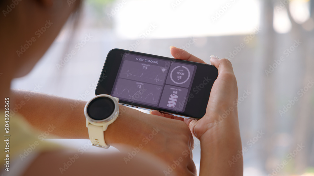Fototapeta premium Agentic AI smart IOT watch sport wrist wear collect bio ECG heart rate data sleep record health care device digital internet of things app. Asia people woman urban tech life better home future living.