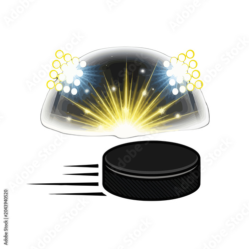 Slika na platnu A black hockey puck moves quickly under bright stadium lights