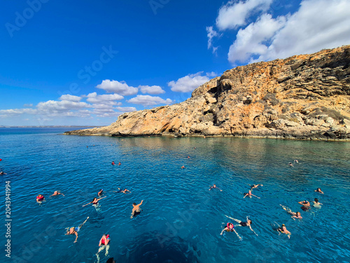 The Blue Lagoon on Cyprus Island tropical sea beach Cavo Greco in the morning. Natural stone rock love bridge