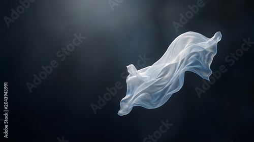 White ethereal fabric floating in air against dark background