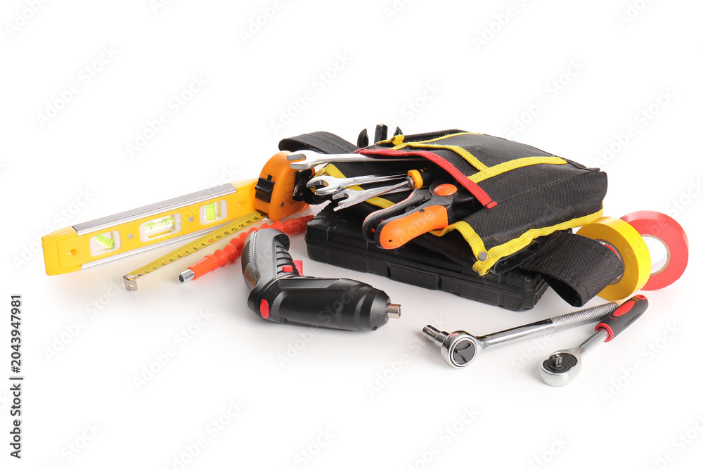 Naklejka premium Tool belt with set of construction tools isolated on white background