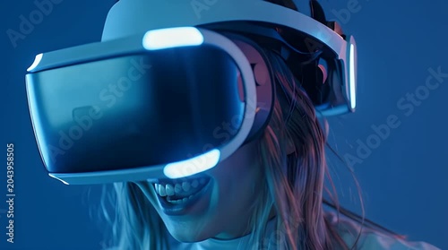 Young woman with VR headset, immersed in virtual reality, smiling with excitement