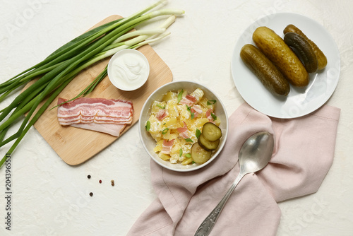 Bowl of tasty potato salad ...