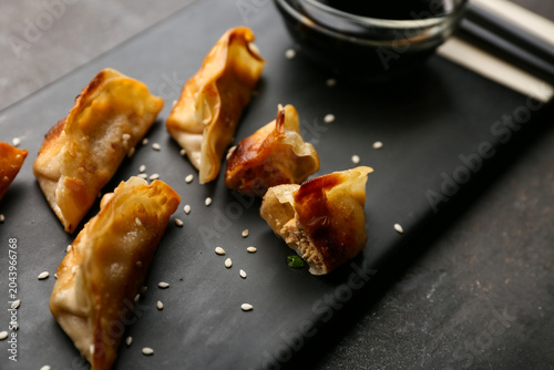 Board with fried Japanese g...