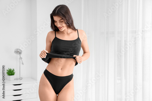 Pretty young woman in under...