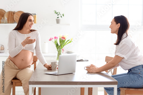 Young pregnant lesbian coup...