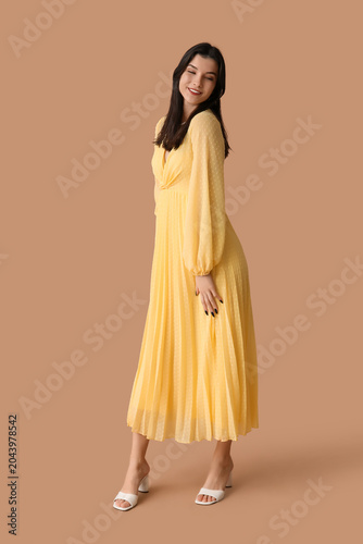 Beautiful young woman in st...