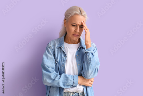 Stressed mature woman on li...