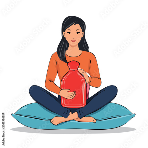 Woman sitting on pillow holding a red hot water bottle