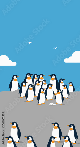 Quadro su tela Group of Penguins Standing on Rocky Shore with Blue Sky and Clouds