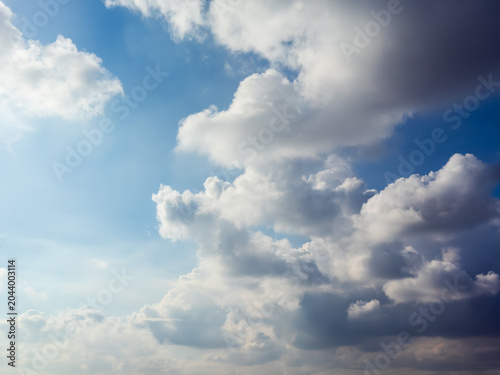 Bright Blue Sky with Fluffy White Clouds on a Sunny Summer Day Natural Cloudscape Background