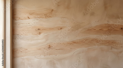 Close up of natural wood grain texture with knots on plywood panel background material laminate
