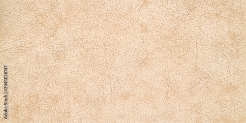 Tableau sur toile A detailed texture of light brown leather showcasing its natural grain and subtle imperfections, providing a tactile and organic background