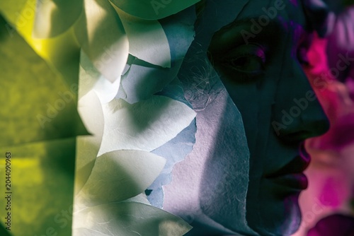 Layered paper art silhouette of a female profile with floral decorative elements for International Womens Day, creative lifestyle campaigns and fashion advertising