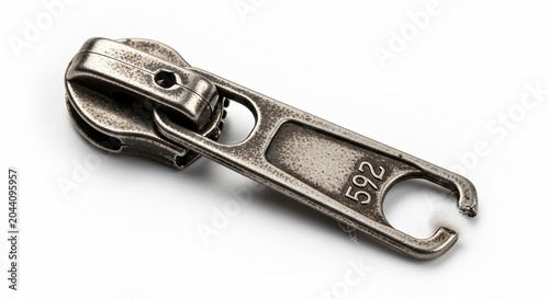 Metal zipper slider pull tab isolated on white background.