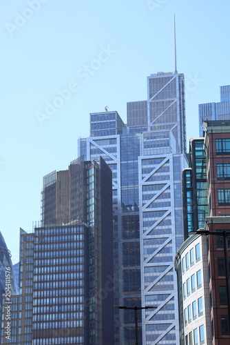 London city skyline with modern skyscrapers at sunny day, financial district cityscape with blue sky