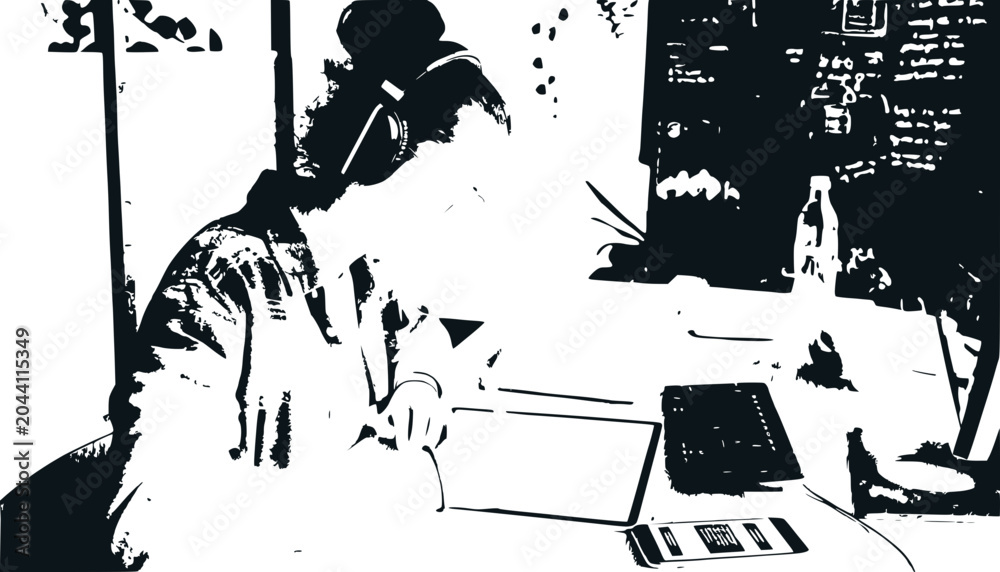 Fototapeta premium Person working on laptop and tablet in modern office, high contrast black and white