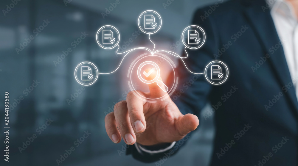 Obraz premium Digital document management system, businessman touching virtual interface for file validation, electronic data storage and compliance concept