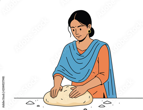 Indian Woman in Traditional Attire Kneading Dough for Roti or Chapati Preparation