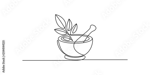 Obraz na płótnie Single line drawing of a mortar and pestle with green leaves, representing herbal medicine and natural remedies