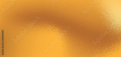 Obraz na plátne Golden frosted glass texture background with warm amber light gradient