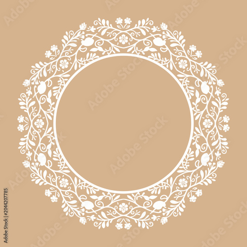 An illustration depicts a floral wreath design on a beige background.