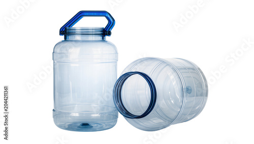 Fotografie Clear plastic water jug with blue handle and another jug lying on its side