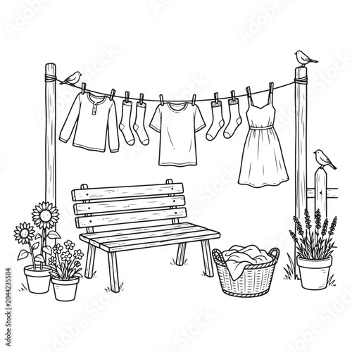 Clothes hanging on a line with a garden bench and flowers