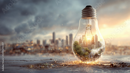 Cityscape inside glowing light bulb, creative concept