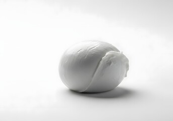 A perfectly spherical and creamy ball of fresh mozzarella cheese, a delightful culinary ingredient, is presented in this high-quality photographic representation, showcasing its inviting texture