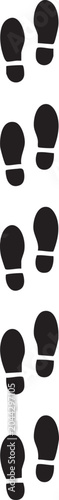 Black footprints walking in a straight line