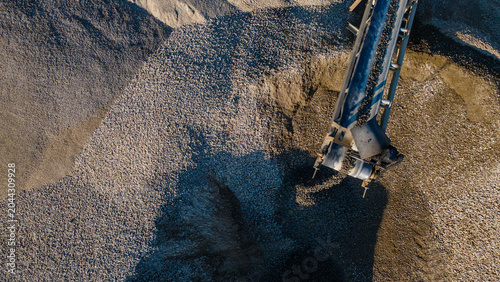 Canvastavla Conveyor System Transporting Ore and Crushed Rock to Stockpile Area in Mining Quarry, Mining Site from Above