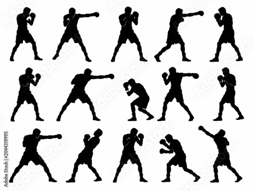 Set of black silhouettes showing professional boxers in various fighting stances and punching poses