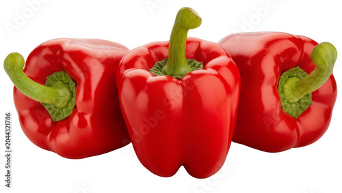 Three red bell peppers with green stems