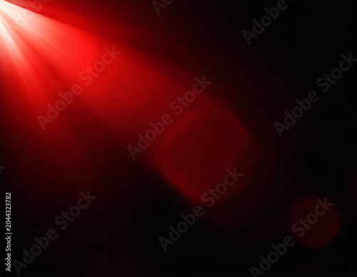 White light refracted into vivid rainbow spectrum across dark background, abstract optical dispersion