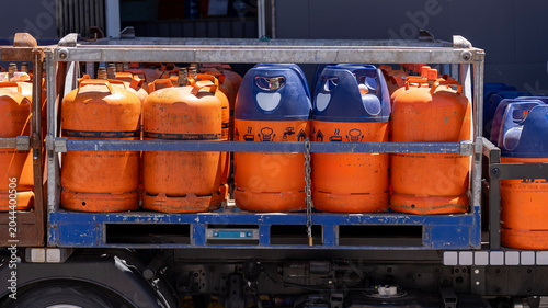 Canvas-taulu Orange Propane Gas Cylinders Stored on Delivery Truck