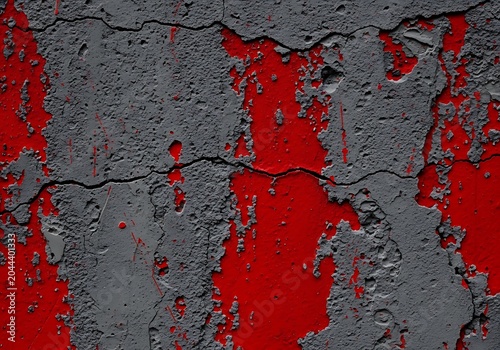 Closeup of gray and red peeling paint on cracked wall surface