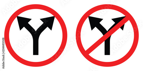 Two road signs indicating a choice between diverging paths and a prohibited split direction