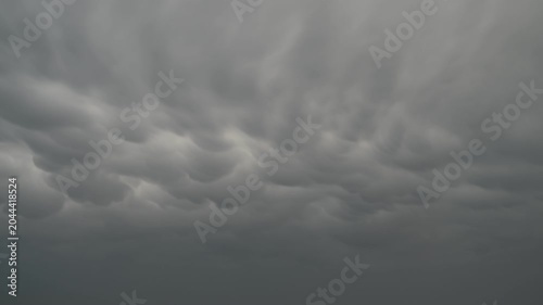 Time-lapse view of dark unique storm clouds in the sky.