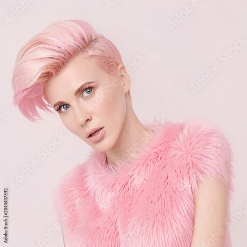 Monochromatic Pink Portrait of a Woman with Pink Pixie Haircut Wearing Furry Top