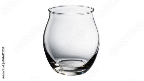 Fotografie Clear glass tumbler with curved sides and textured base