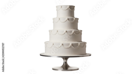 Four tier white wedding cake with decorative piping