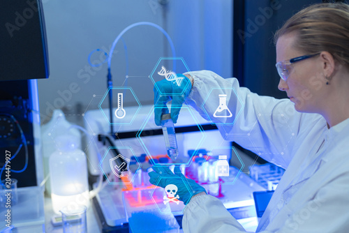 Bild auf Leinwand scientist testing water quality sample for microplastics and chemical contaminants in laboratory