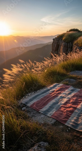 Sunrise picnic on mountain top.