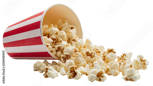 Fotografie Red and white striped bucket spilling popcorn
