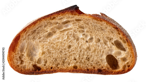 Billede på lærred Sourdough bread slice with airy crumb and dark crust